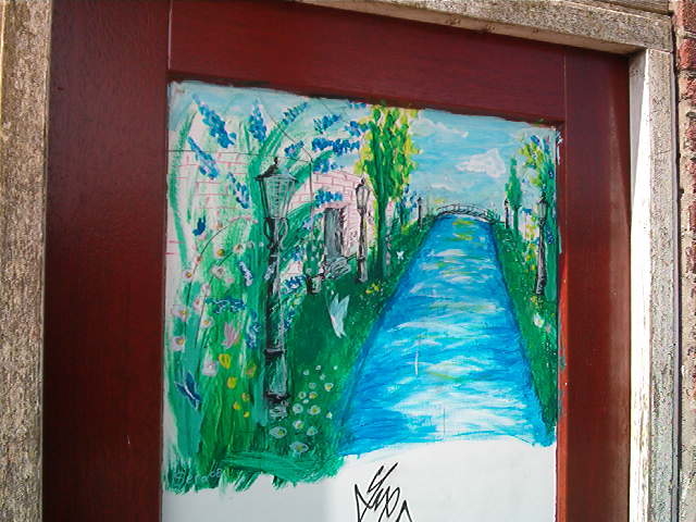 Deur eigengemaakt schilderij op een deur. Foto mei 2009 