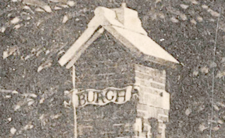 Detail van het hek met deel van de naam: Burgh  
