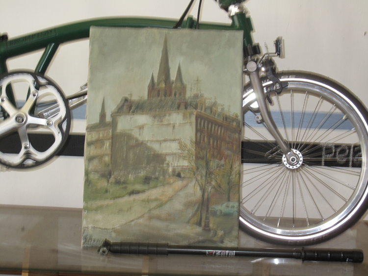 Het schilderij in de fietsenwinkel  